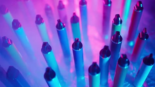 Colorful Vape Devices with Blue and Purple Lighting