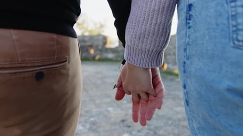 Couple Hold Hand Together and Walk in the Balcony During Valentines Day