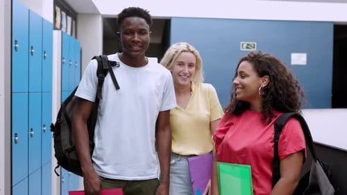 Multiracial Group Portrait of High School Students Smiling at Camera