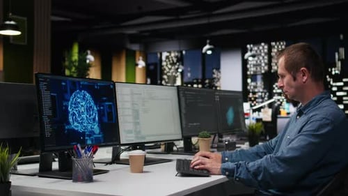 System Administrator in Office Analyzing Machine Learning Algorithms