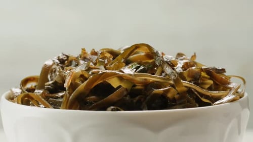 Japanese Wakame Sea Weed Laminaria Chuka Fermented Food Closeup on a Detail of Hiyashi Wakame Chuka