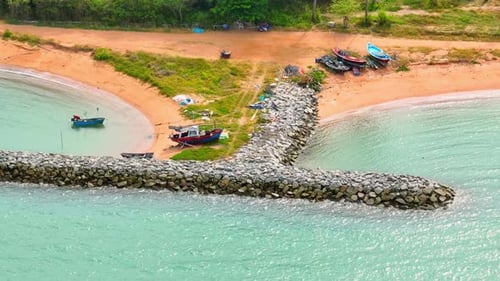 Viewed from a drone's aerial perspective, breakwaters present a striking.