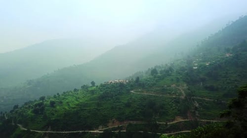 Breathtaking Misty Mountain Landscape Featuring Winding Roads and Scenic Views Everywhere Stock Clip
