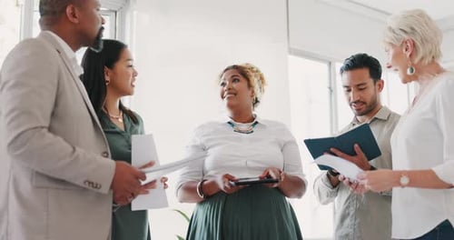 Yes, consulting or business people with tablet and documents for research