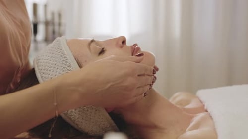 Professional Face Massage at a Tranquil Spa Setting