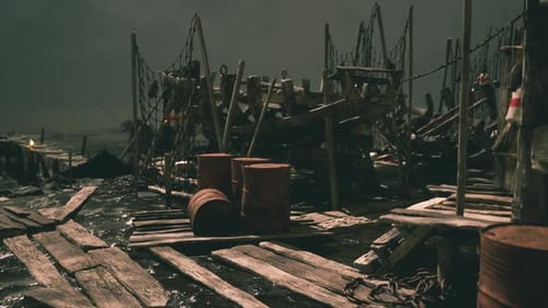 Old Wooden Pier at Night with Barrels and Fishing Equipment Near the Water