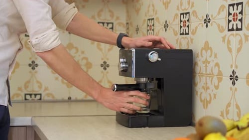 Making Coffee with Espresso Machine in Kitchen