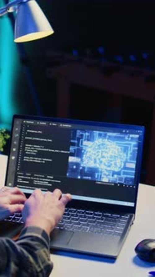 Vertical Video Teleworking IT Specialist in Apartment Office Uses Programming to Upgrade AI