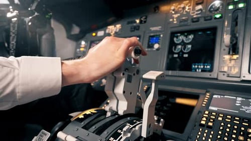 Airplane pilot controls throttle during flight or takeoff Cockpit view close-up of air traffic