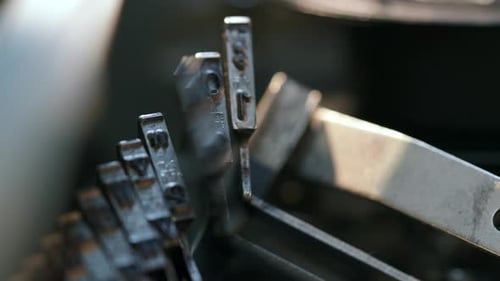 Close View Inside Typewriter Type Bars Extreme Close Up Cinematic Shot of Hammers Typing Letters on