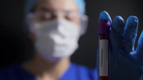 Medicine, Health and Pandemic Concept - Close Up of Young Female Doctor