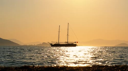 Sailing Boat at Sea During Golden Hour
