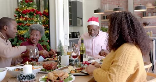 Family Gathering for Christmas Dinner Celebration at Home