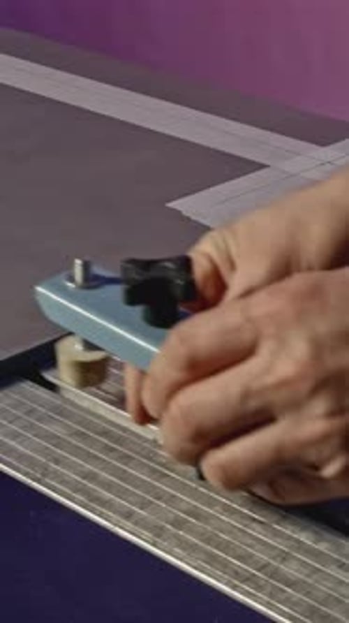 Close Up of Worker Using Pen to Fasten Grey Board Creative Carpentry Works Details