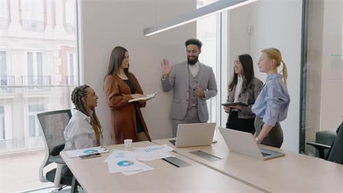 Engaging in Diverse Team Collaboration Within a Contemporary Office Environment Today