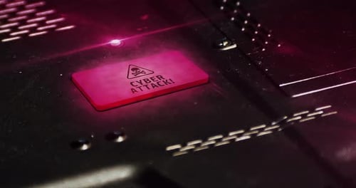 Cyber Attack Warning on Digital Chip with Red Alert Light