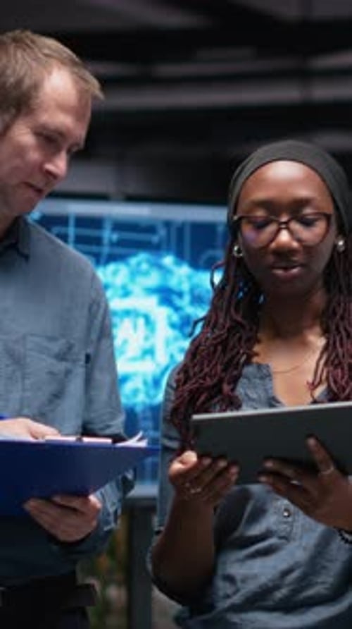 Vertical Video Portrait of Smiling Engineers in Office Developing Machine Learning Algorithms