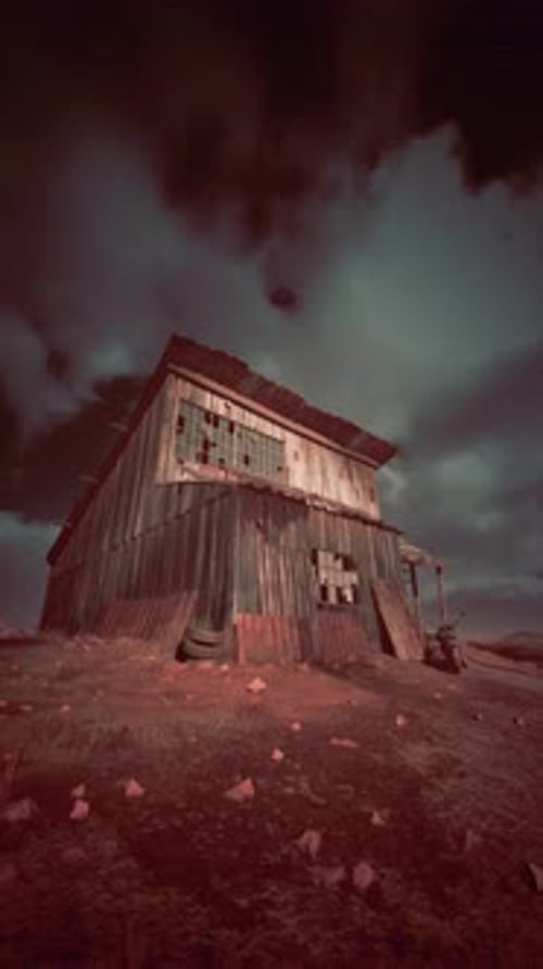Old Wooden Building on Dry Grass Field