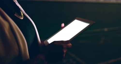 4k video footage of a businesswoman using a digital tablet outside at night