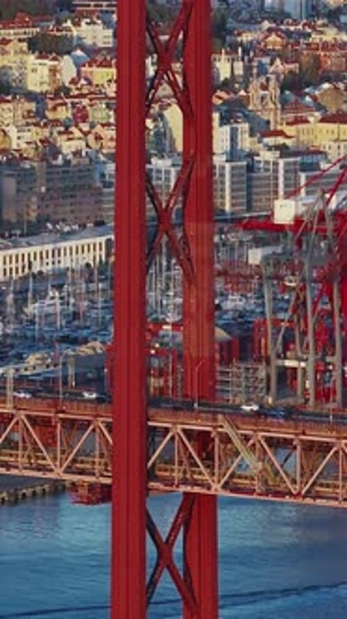 Aerial View of 25 De Abril Bridge Over the Tagus River at Sunset in Lisbon Portugal