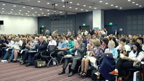 Listening to speech about company marketing in novosibirsk Russia auditorium