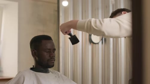 Man Gets Haircut at the Barber Shop