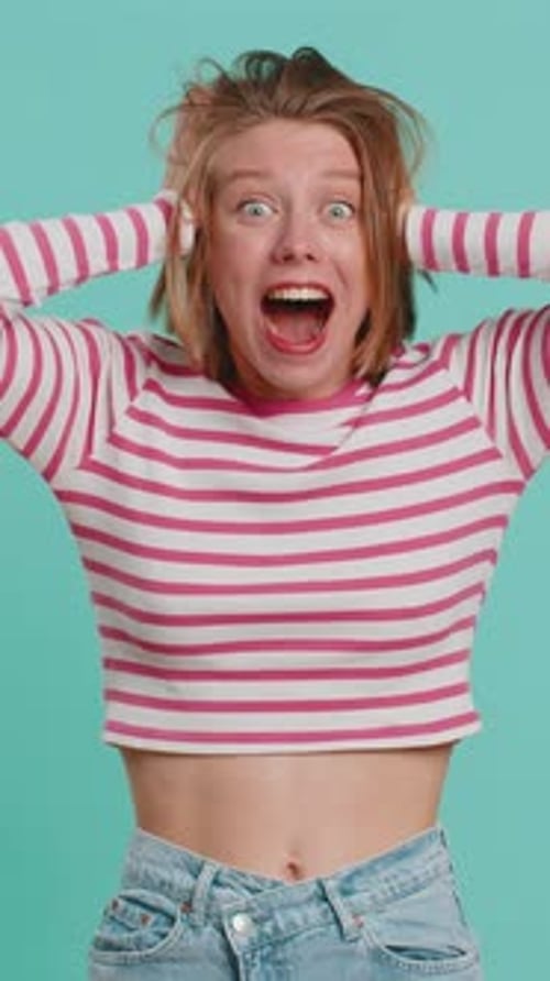 Surprised Woman Reacts with Shock and Amazement