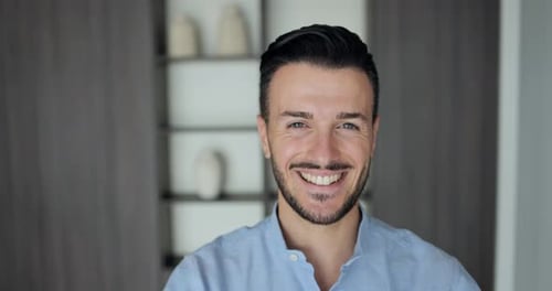 Young business man work in corporate office and smiling on camera - Company and male entrepreneur