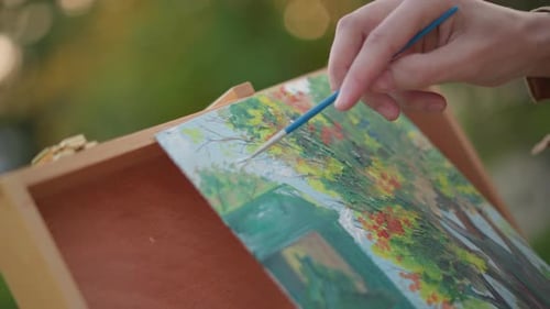 Vibrant Outdoor Artwork Depicting Charming Village Setting Casual Easel Showcases Lively Urban