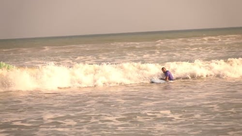 Man Surfing On Board In Sea, Super Slow Motion 240fps