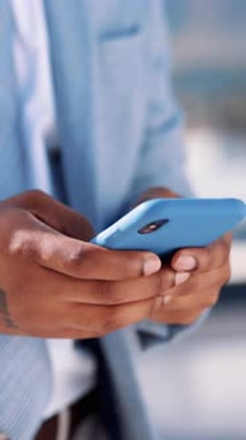 Typing, hands and phone with business man in city for communication, real estate listing