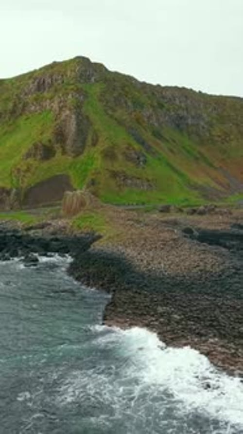 Social ratio approaching aerial video of The Giant's Causeway in Bushmills, County Antrim in NI
