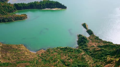 Volcanic Island Lagoon Drone View Rippling Turquoise Ocean Washing Rocky Coast