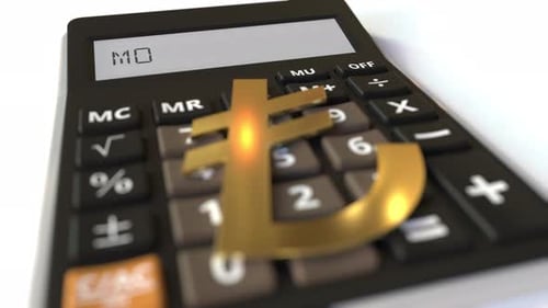 Lira Money Symbol on the Keys and MORTGAGE Text on Calculator