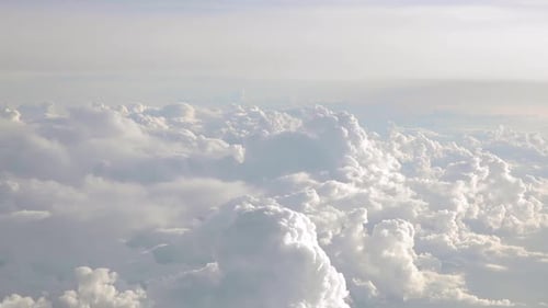 Aerial View of Fluffy Clouds in the Sky