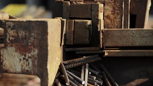 Rebar being Cut by Metal Cutting Machine
