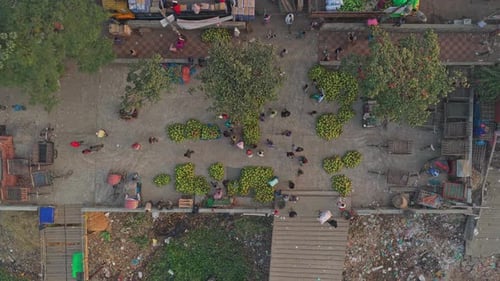 Drone footage of crowded riverside market in Old Dhaka, Bangladesh