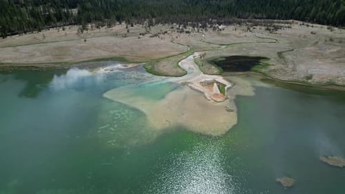 Winding River and Lake in Alps