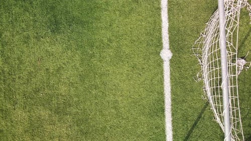 Aerial overhead view of soccer net from drone