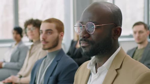 Adults Attending Corporate Training in Office Setting