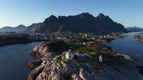 Henningsvaer Lighthouse and Football Field in Lofoten Islands Norway During Golden Hour