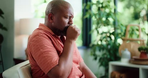 Sick, cough and black man in house with chest pain, infection or breathing problem in lung virus