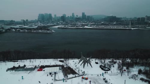 aerial shot around Jean Drapeau Park in Montreeal City with the Saint Laurent River and Montreal cit
