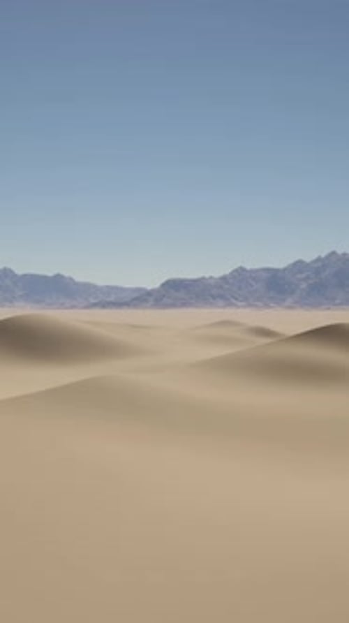 A Desert Landscape with Mountains in the Distance