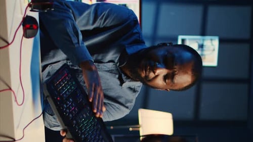 Vertical Video Man Reviews Keyboard in Apartment Studio