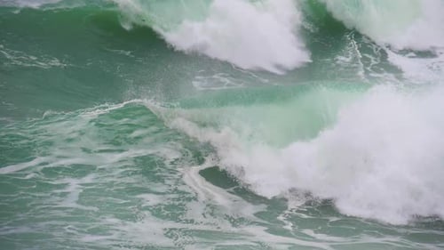 Super Slow Motion of Stormy Waves Crashing into Deep Blue Waters