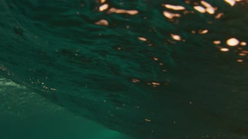 Underwater view of the breaking wave in the Maldives