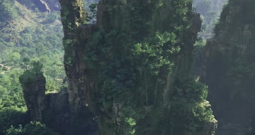 Breathtaking View of Lush Green Cliffs in a Mountainous Region During Daylight