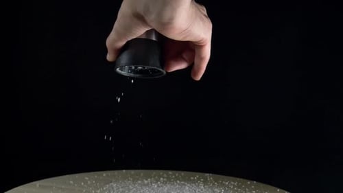 Salt Mill on a Black Background