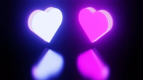 Two vibrate colorful neon glowing hearts vj loop animation background